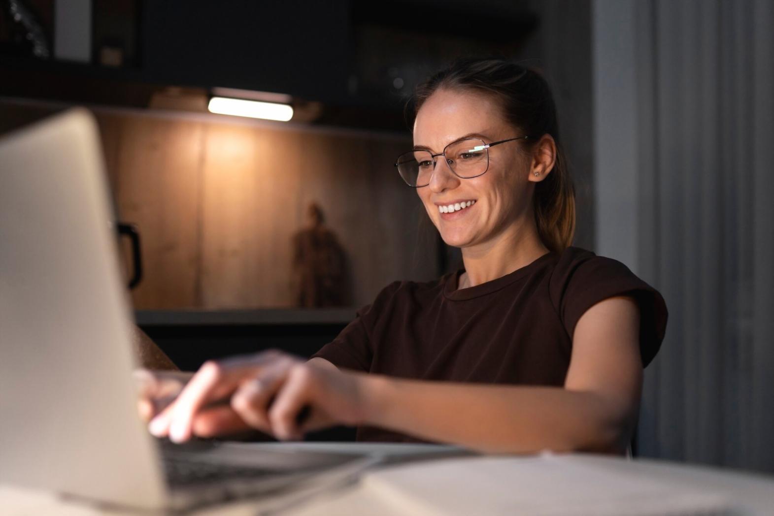 Person reviewing financial documents at organized workspace